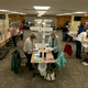 Election officials and volunteers process absentee ballots at Ramsey County’s absentee ballot count center on November 2, 2020, in St Paul, Minnesota.